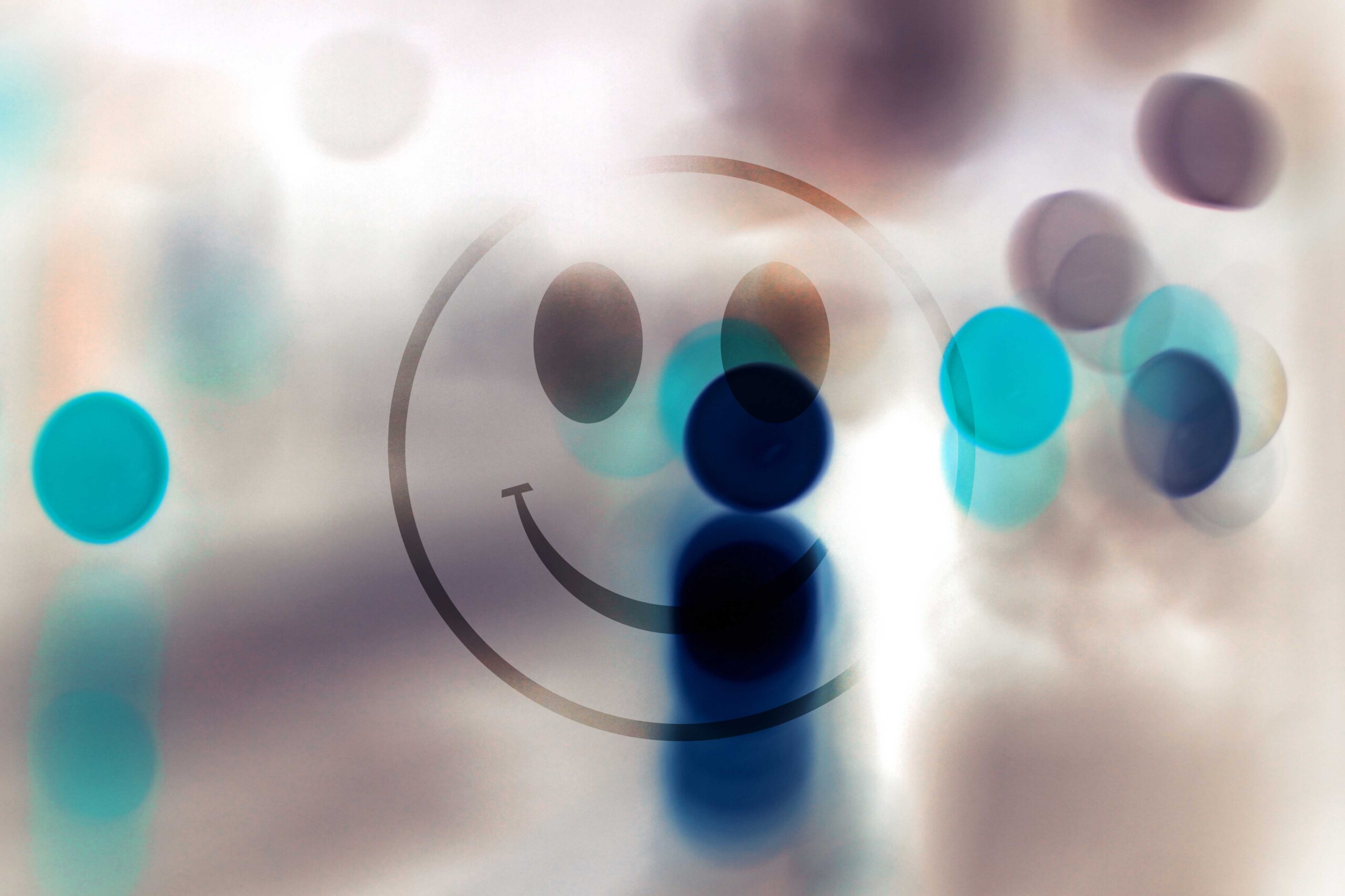 Yellow smiley associated with acid house and rave culture