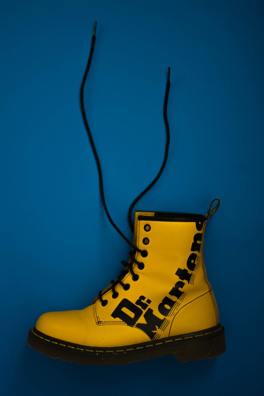 Yellow Dr. Martens boot, an example of workwear adopted by punk and alternative subcultures