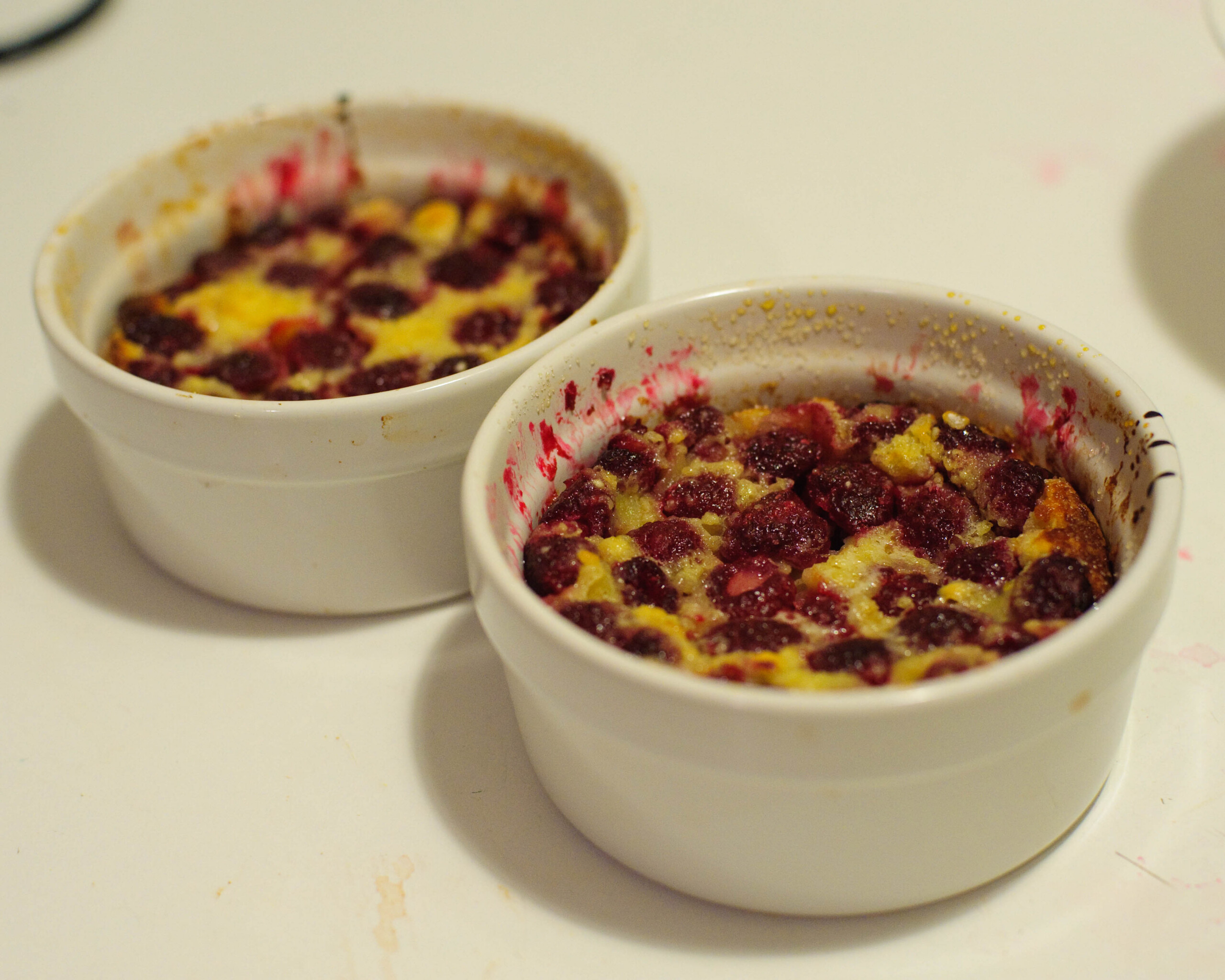 Two reusable ramekins holding desserts, illustrating packaging that remains useful after purchase