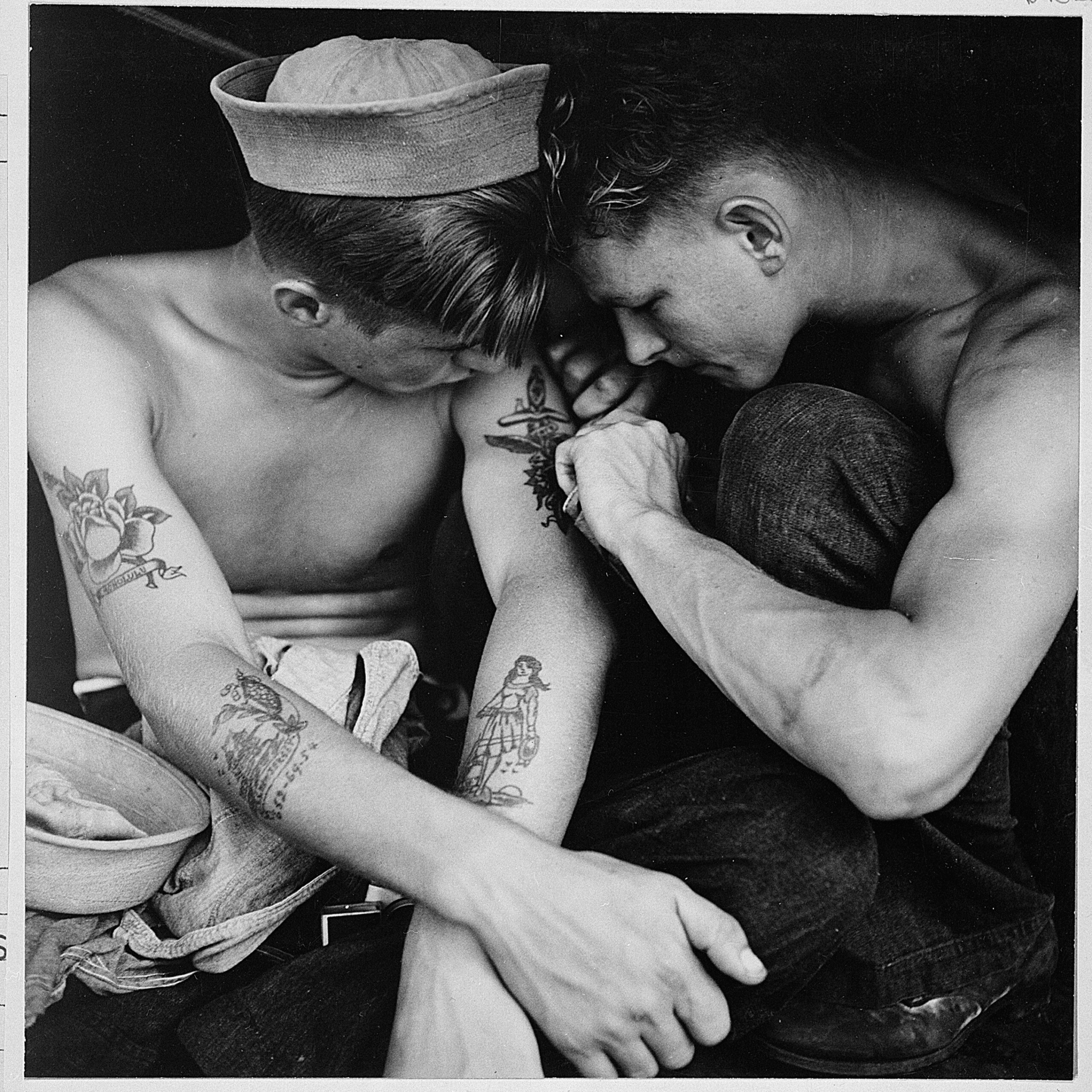 Tattooed sailor aboard USS New Jersey in 1944, illustrating the long history of tattoos as social and cultural signals
